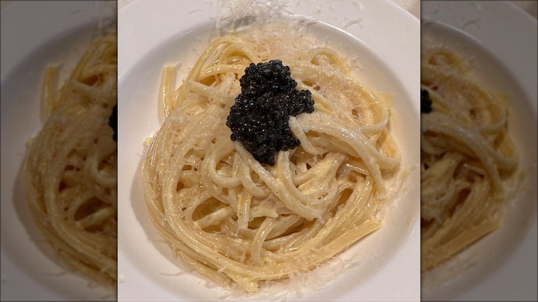 pasta topped with black caviar