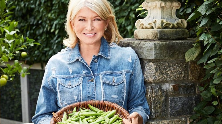 Martha Stewart with dishes of her recipes