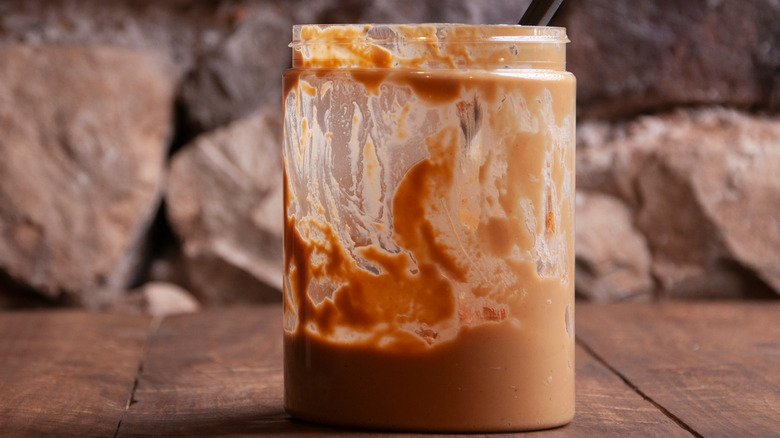 Half-empty jar of peanut butter