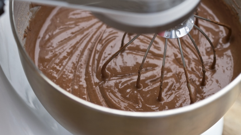 cake batter in bowl of mixer