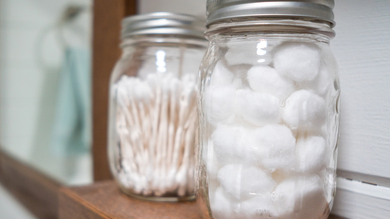 Mason jars storing cotton