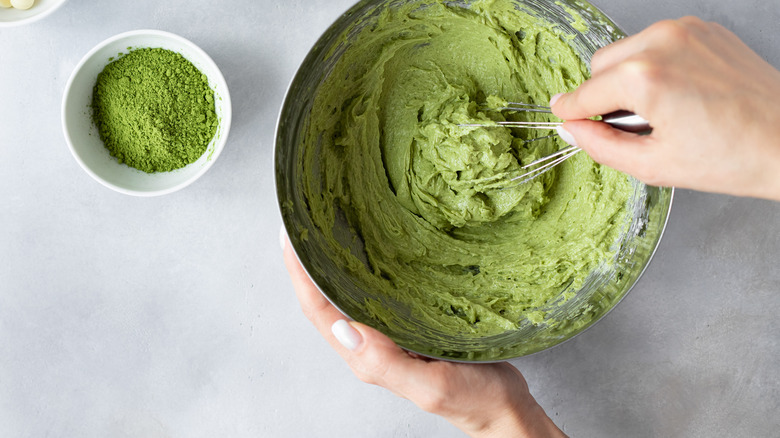 Whisking matcha in a bowl