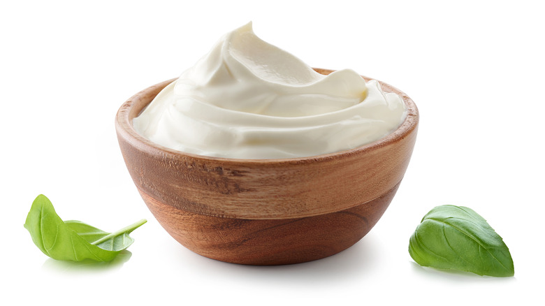 A bowl of creamy yogurt, labne, or sour cream