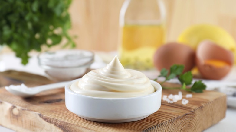 Fresh mayonnaise in white bowl