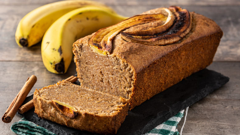 Moist banana bread sliced on a board