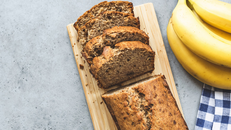 Sliced banana bread on a board