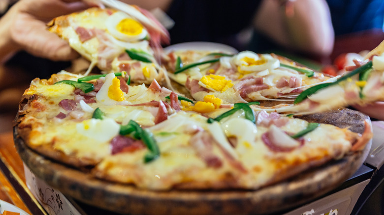 pizza with hard boiled eggs