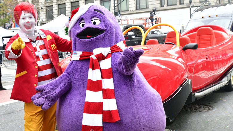 Grimace and Ronald standing together