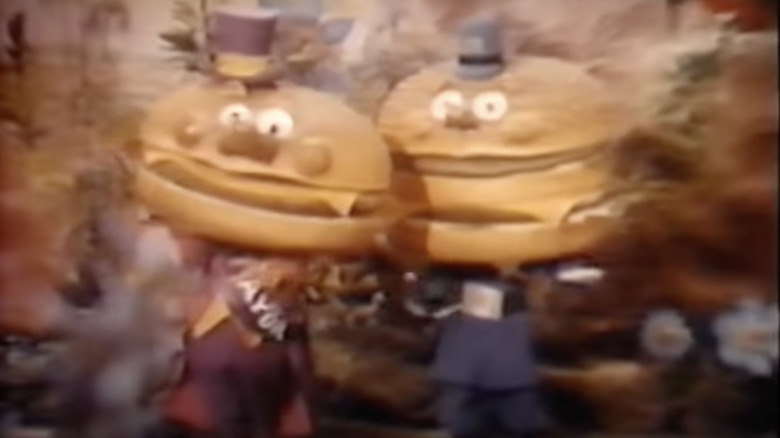 Mayor McCheese with a supporter 