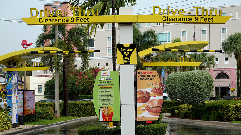 rainy McDonald's drive-thru standing empty