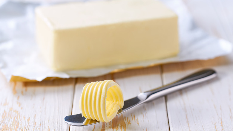 butter and piece on knife