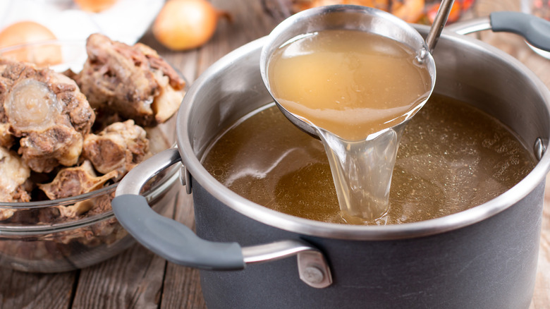 ladling beef stock