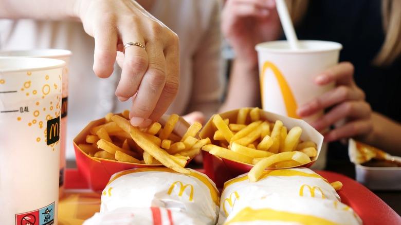 McDonald's customers eating fries