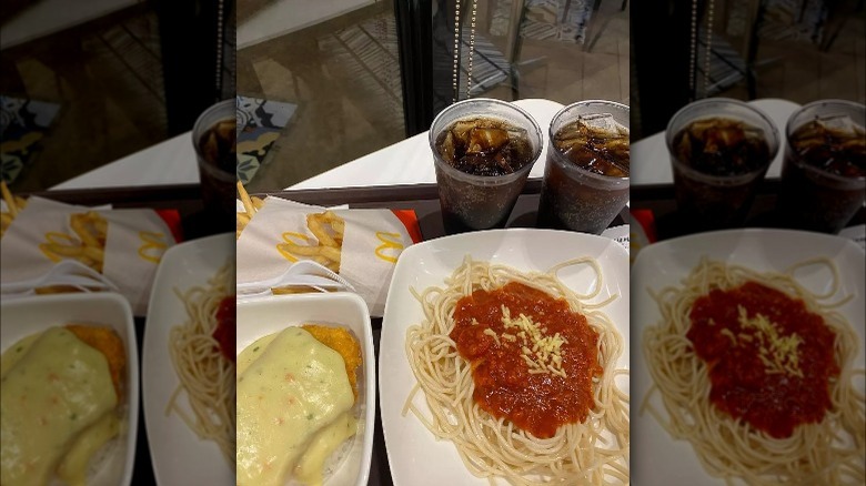 Mcspaghetti served alongside fries and other menu items