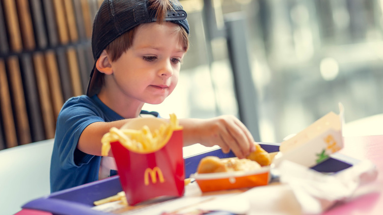 child eating mcnuggets