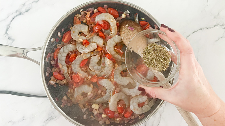 shrimp with veggies in pan 