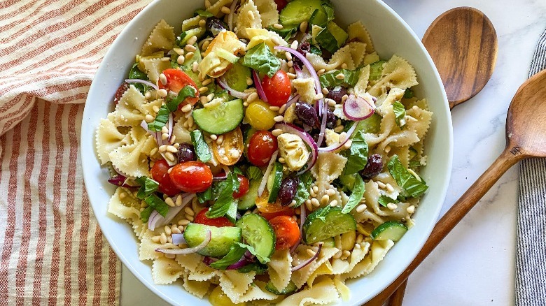 Mediterranean pasta salad in serving dish