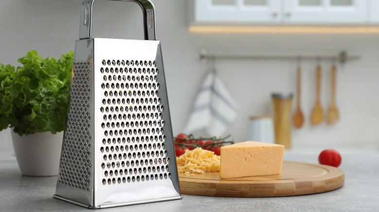 Box grater with grated cheese