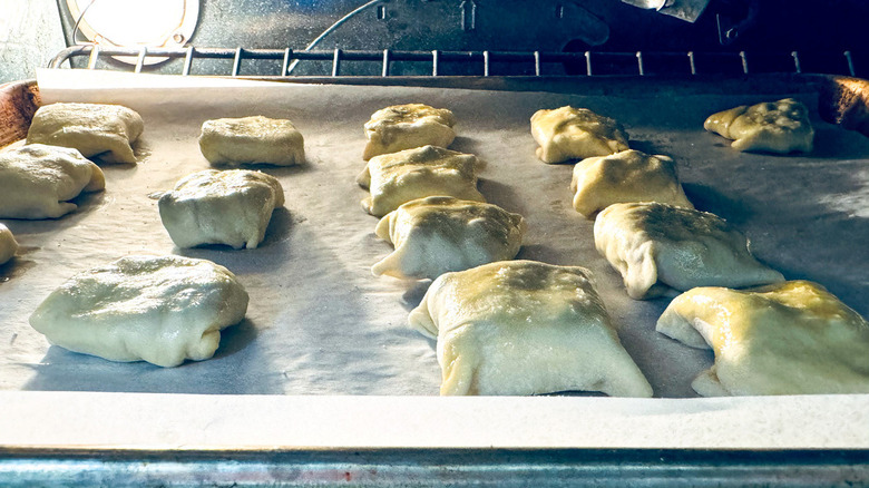 uncooked pastries in oven