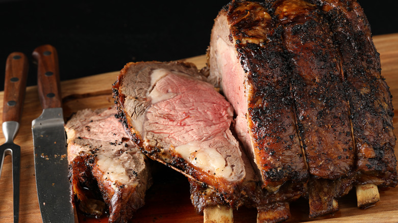 Sliced prime rib on board