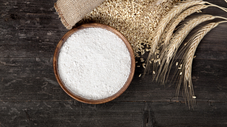 bowl of flour with wheat ears