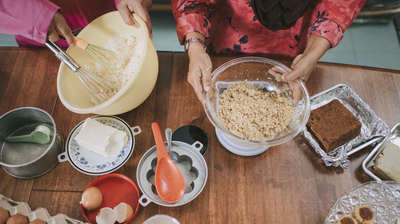 two people baking