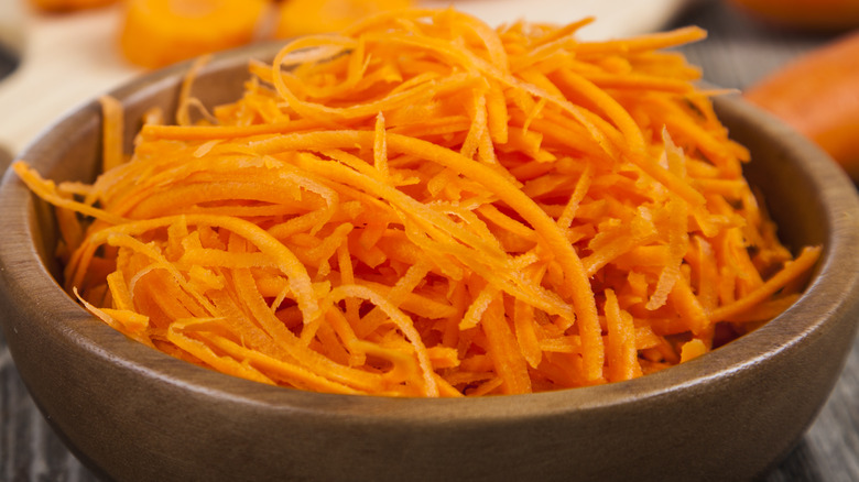 grated carrots in bowl