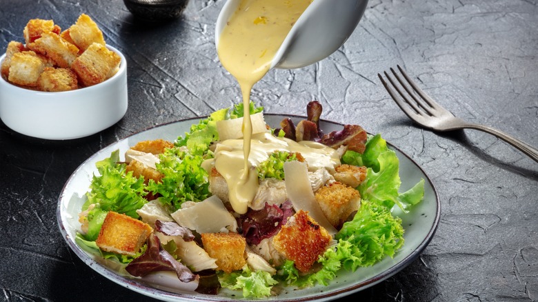 Caesar dressing on salad