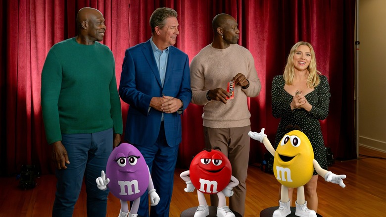 Bruce Smith, Dan Marino, Terrell Owens, and Scarlett Johansson with M&M mascots