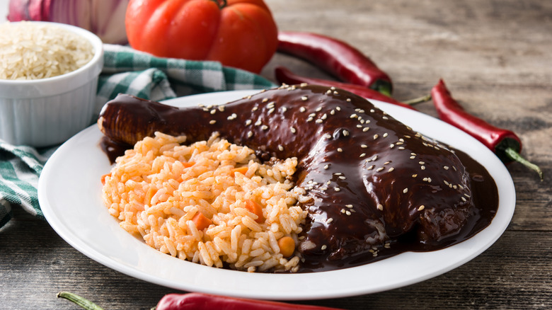 mole poblano covering turkey leg