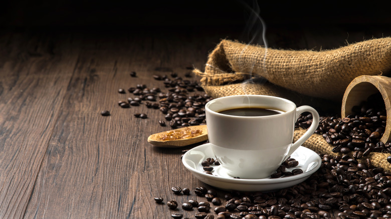 Coffee, coffee beans on table