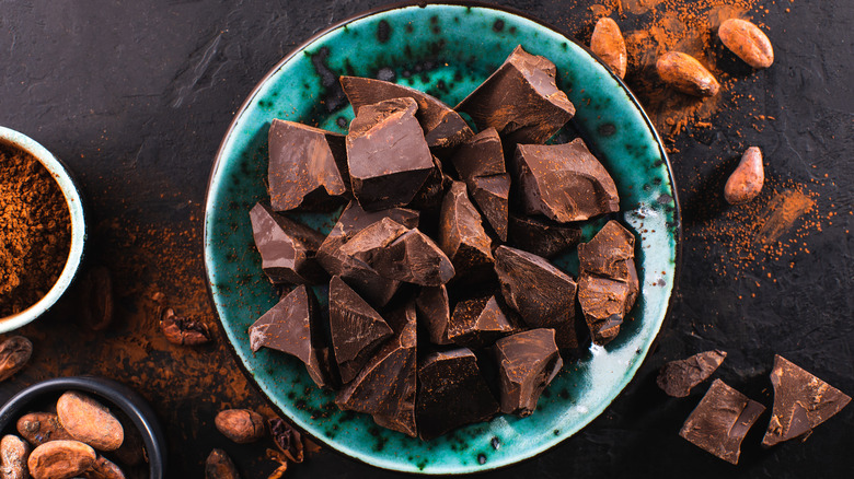 Dark chocolate in turquoise bowl