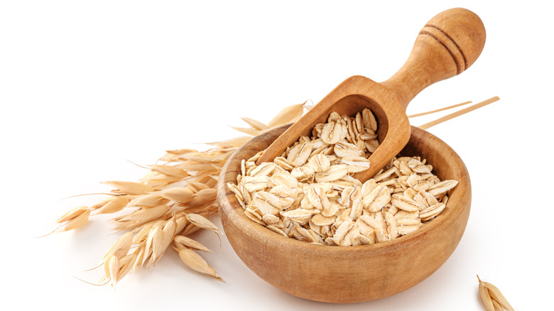 Oats in bowl white background