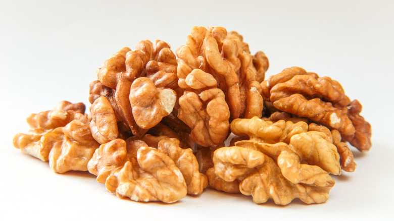 Walnuts on white background