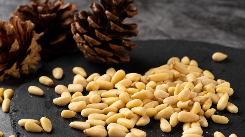 Chinese pine nuts on slate tablet