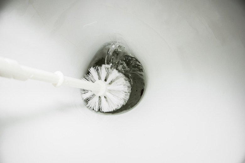 Clean your toilet with baking soda, borax and cola