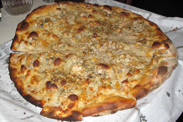 White Clam Pizza with Grated Cheese, Olive Oil, Fresh Garlic and Oregano