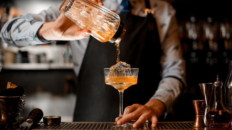 bartender making cocktail