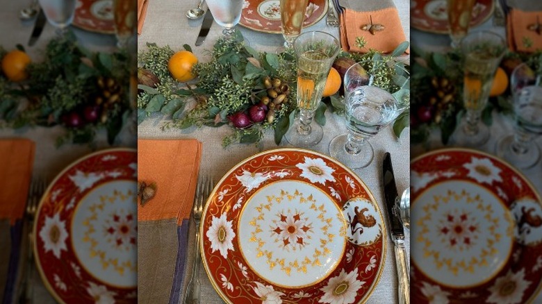 Ina Garten's holiday table with plate, glasses