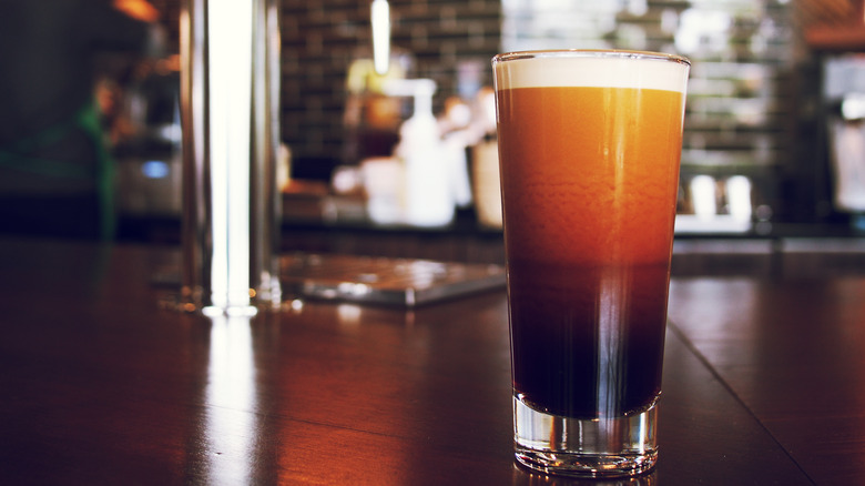 Cold brew in front of a nitro tap