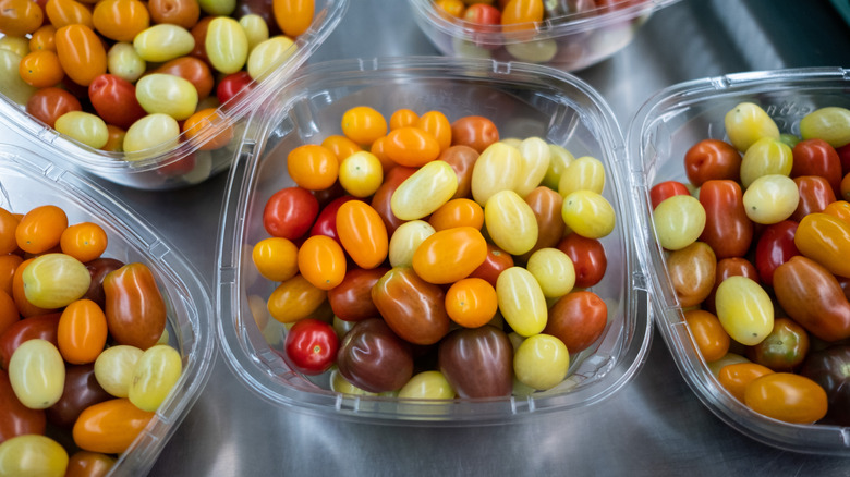 Grape tomatoes in plastic containers