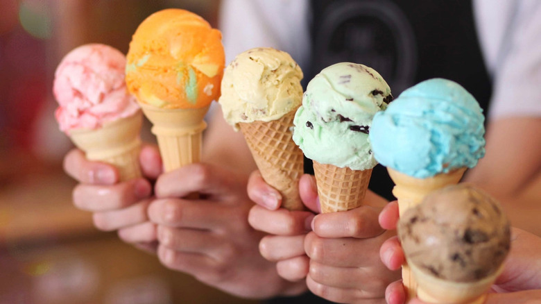 Different colors and flavors of ice cream scoops