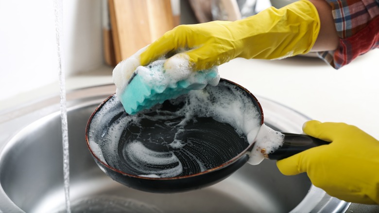 Washing pan with soapy water