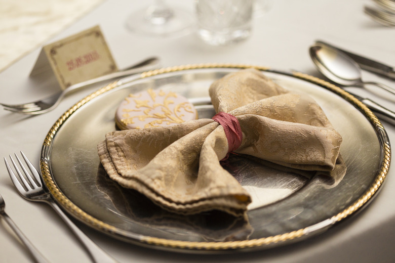 Place your napkin on your lap when you sit at the table