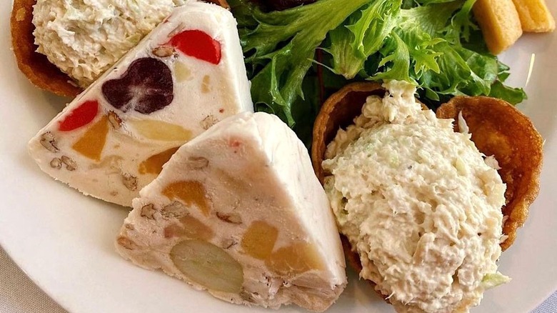 frozen fruit and chicken salad on plate