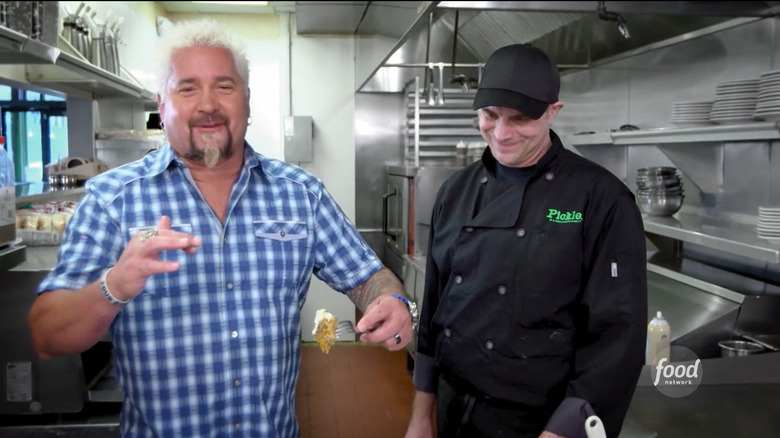 Guy Fieri tasting pumpkin bread french toast