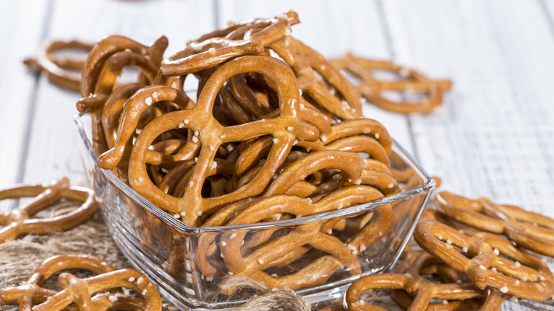 Pretzels in glass bowl and on countertop