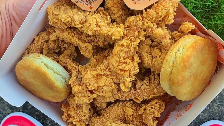 Popeyes fried chicken and biscuits in box