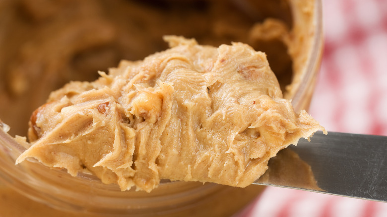 Scoop of peanut butter on a knife