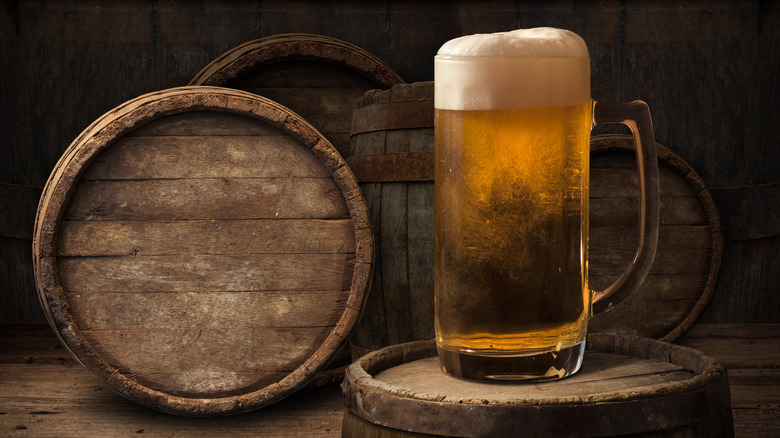 Beer glass on beer barrel